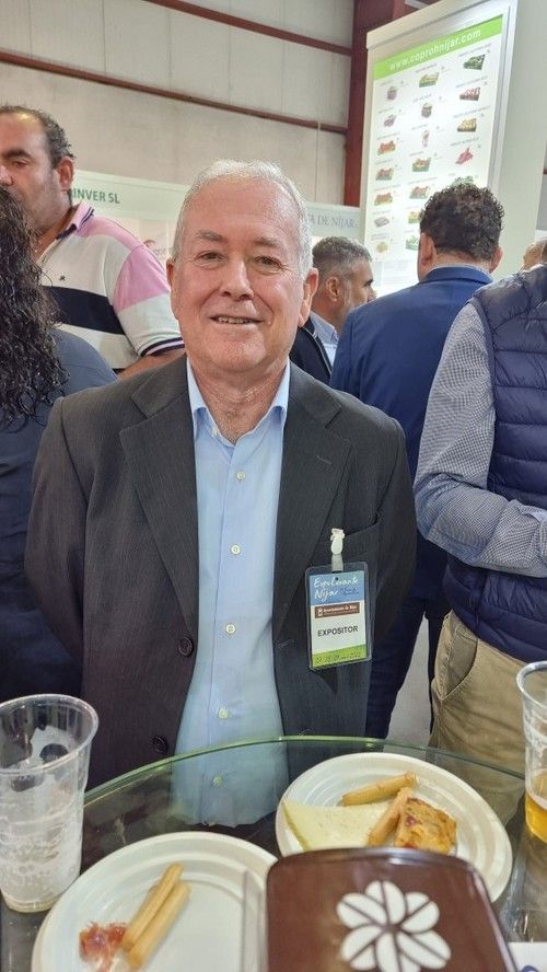 Juan Segura, presidente de Coprohníjar, en el expositor de la cooperativa.